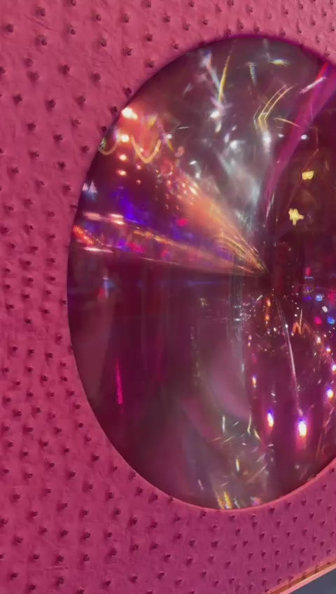 Spirit Orb – Pink Blush (24" x 24") by Paul Makovski, a 3D optical illusion artwork featuring a reflective orb set against pink ostrich-textured leather.